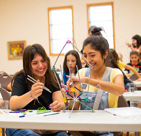 STEAM workshop with students building and experimenting